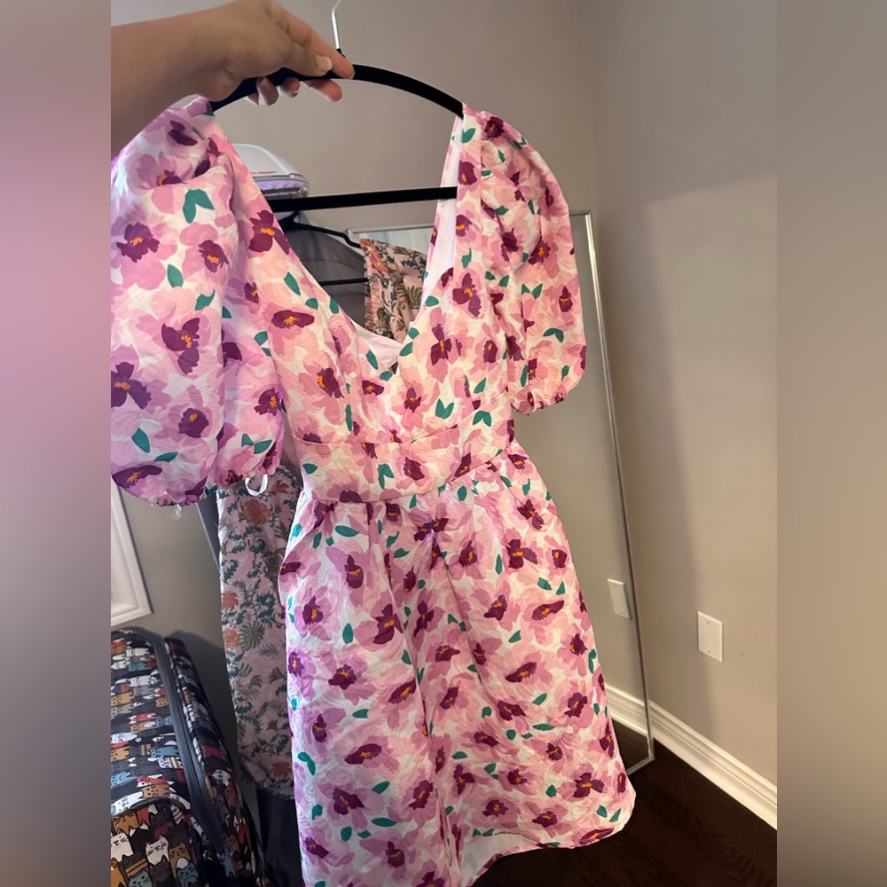 Brand new without tags dress size L . Can fit M and XL too. Adjusting dress